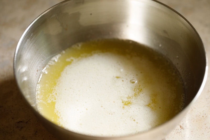 Melted butter in a bowl.