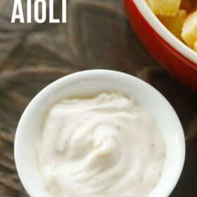 Garlic aioli in bowl with text layovers.