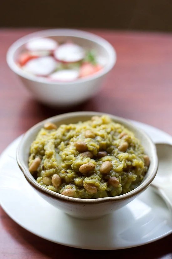 palak khichdi served in a bowl.