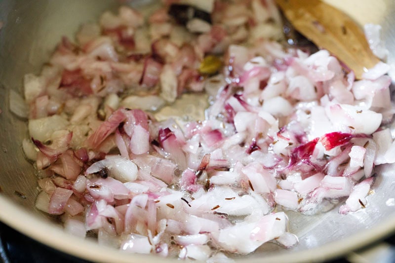Onion being sautéed.
