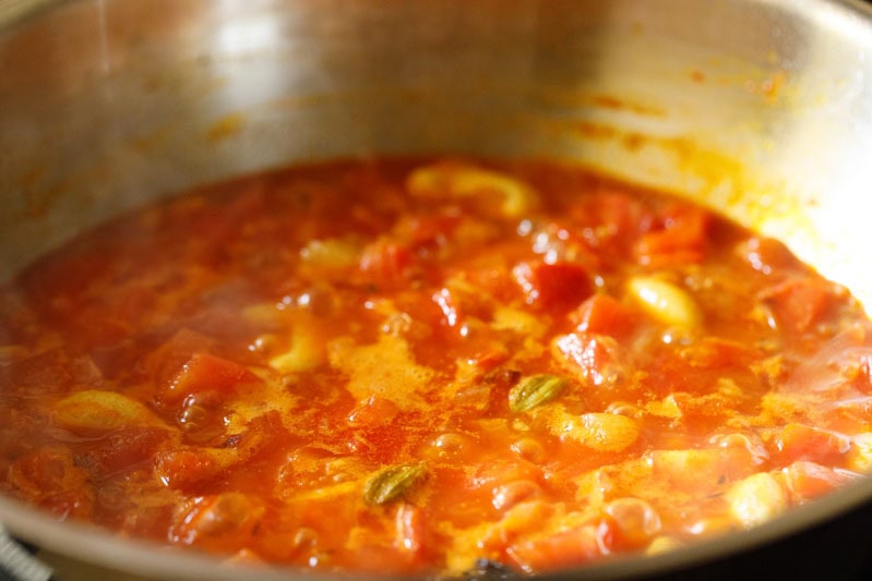 Water added and onion-tomato mixture being simmered.